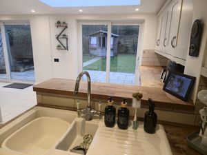 Kitchen and family room angle 1- click for photo gallery